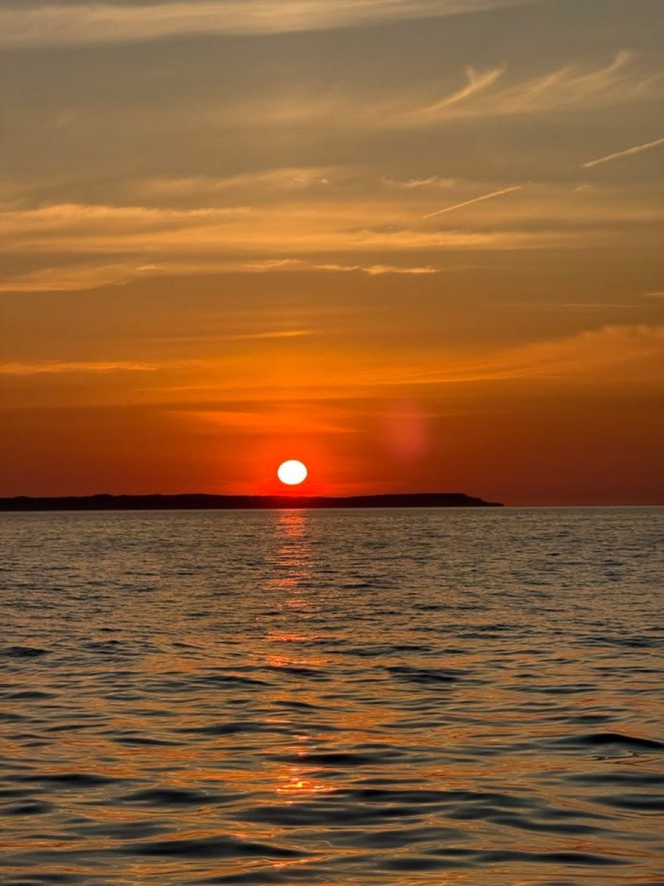 Sunset over the Fox islands up here in northern Lake Michigan - photo 3